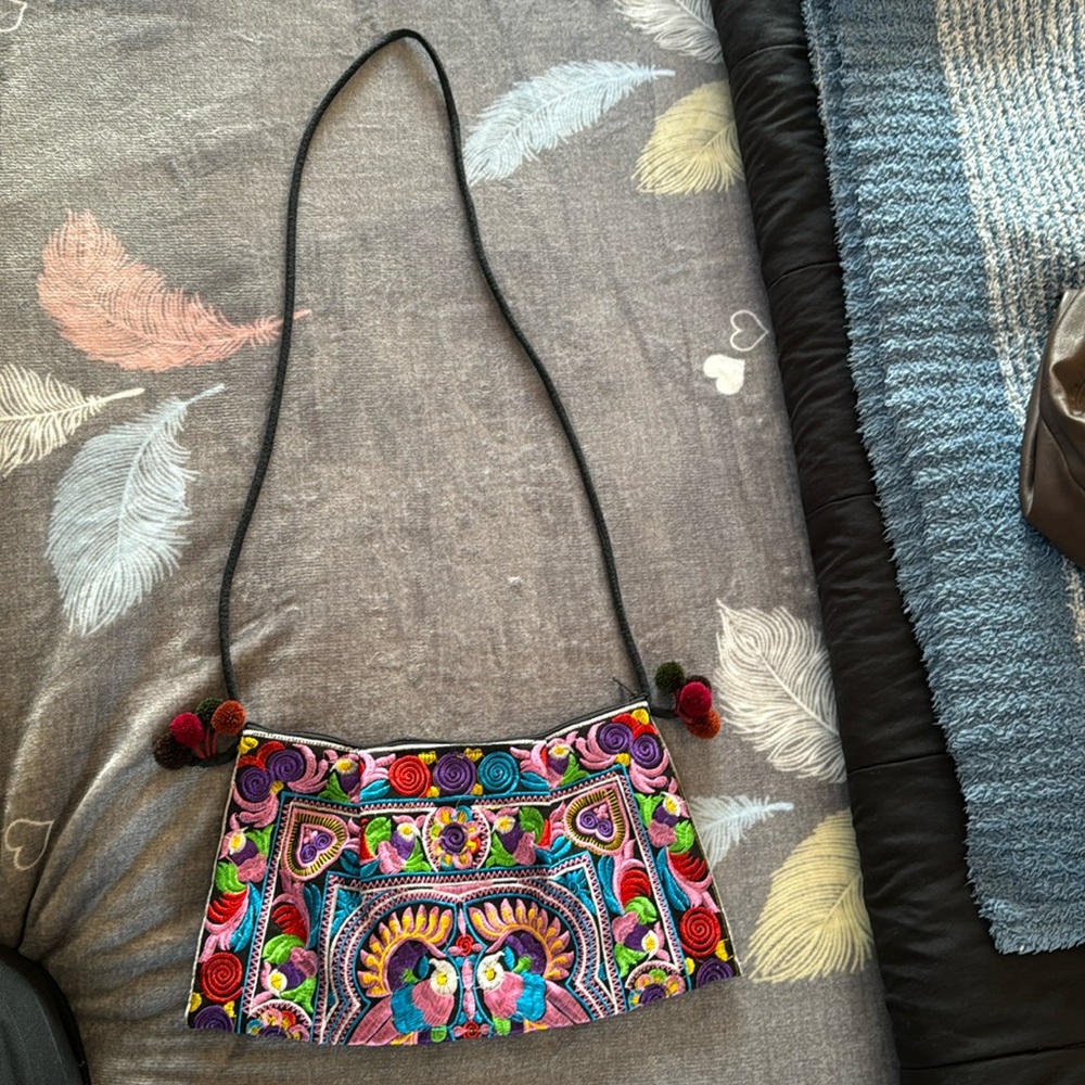 A multicolor crossbody purse